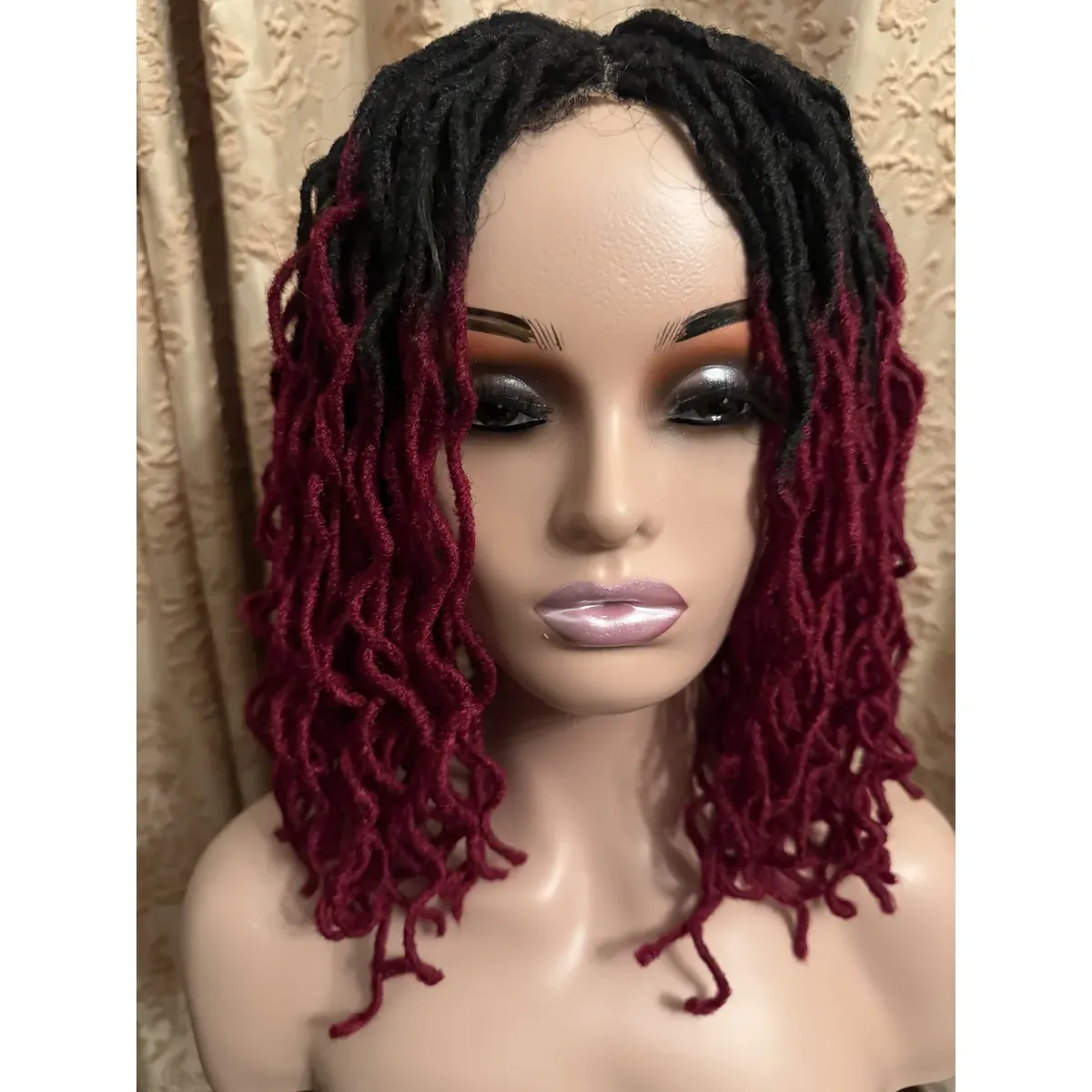 Ombré Dreadlock Wig, black to burgundy, on a mannequin